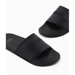 Armani Exchange Exchange Textured Open Toe Flat Slides in Black