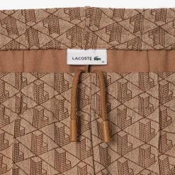 Lacoste Flared Monogram Sweatpants in Beige