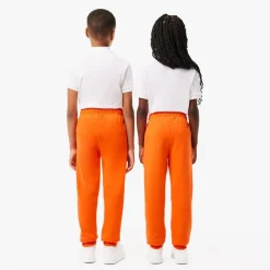 Lacoste Juniors Fleece Sweatpants in Orange