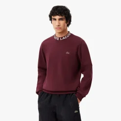 Lacoste Logo Crewneck Sweatshirt in red maroon