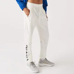 Lacoste Nautical Print Track Pants in Cream