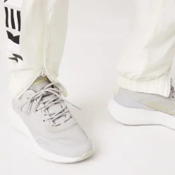 Lacoste Nautical Print Track Pants in Cream