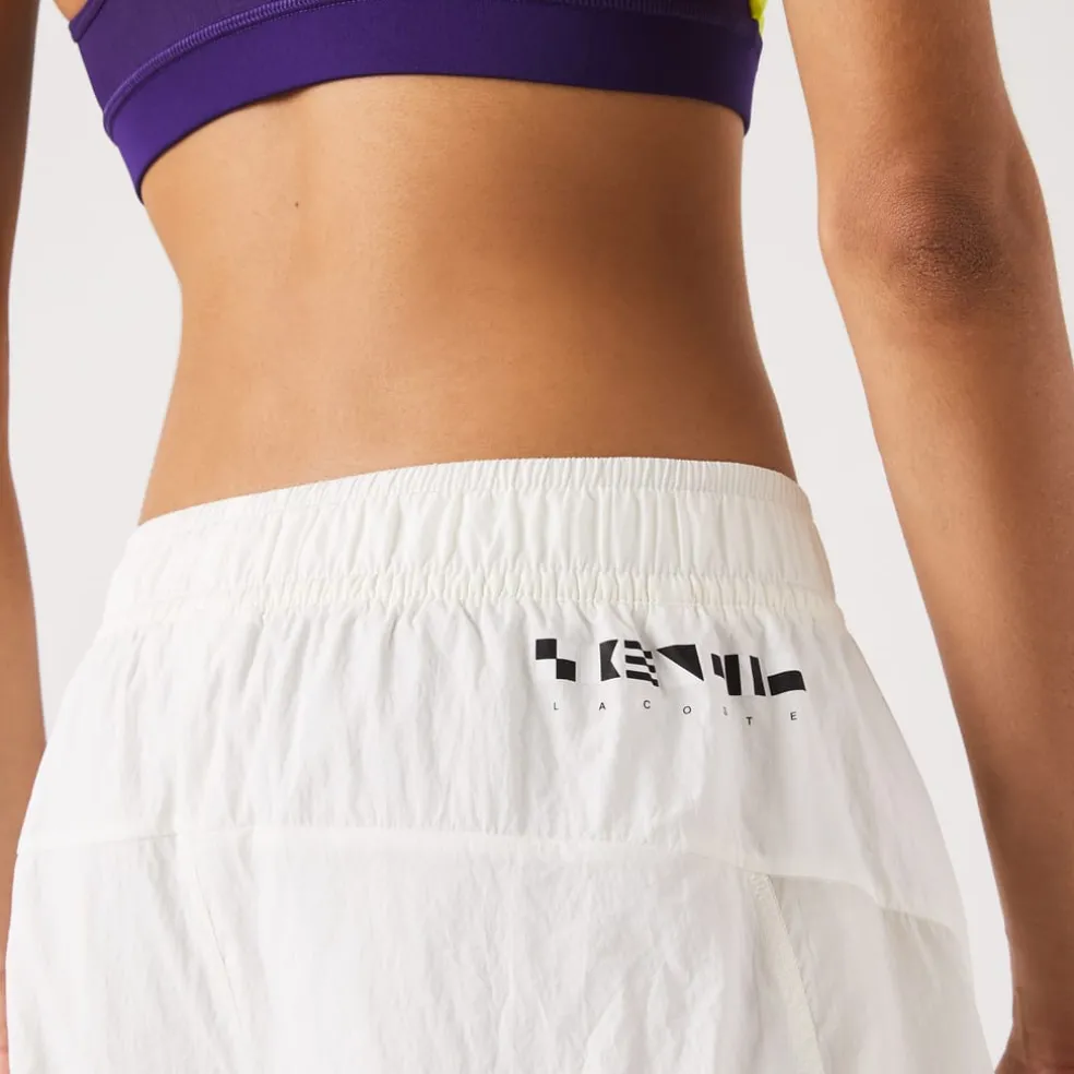 Lacoste Nautical Print Track Pants in Cream