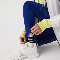 Lacoste Sport Zip Pockets Tapered Tracksuit Bottoms in Multi colour