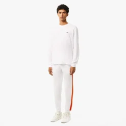 Lacoste Tapered Leg Sweatpants in white orange