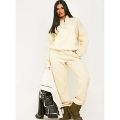 Missy Empire Girl Embroidered 90s Cuffed Jogger in Cream