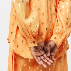 Never Fully Dressed Fleck Miley in Orange