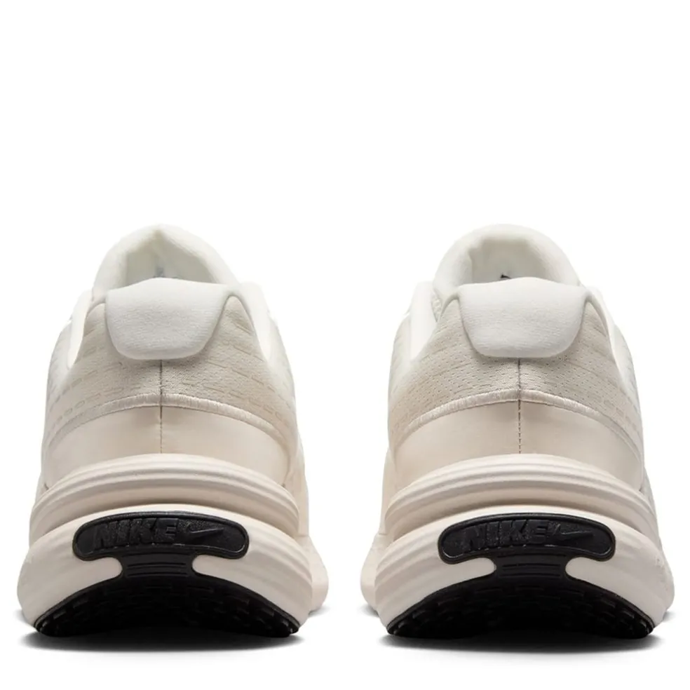 Nike Uplift Low Top Sneakers in Beige